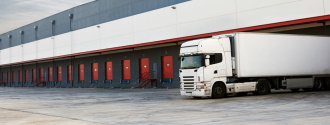 a semi-truck preparing to unload for the distribution industry